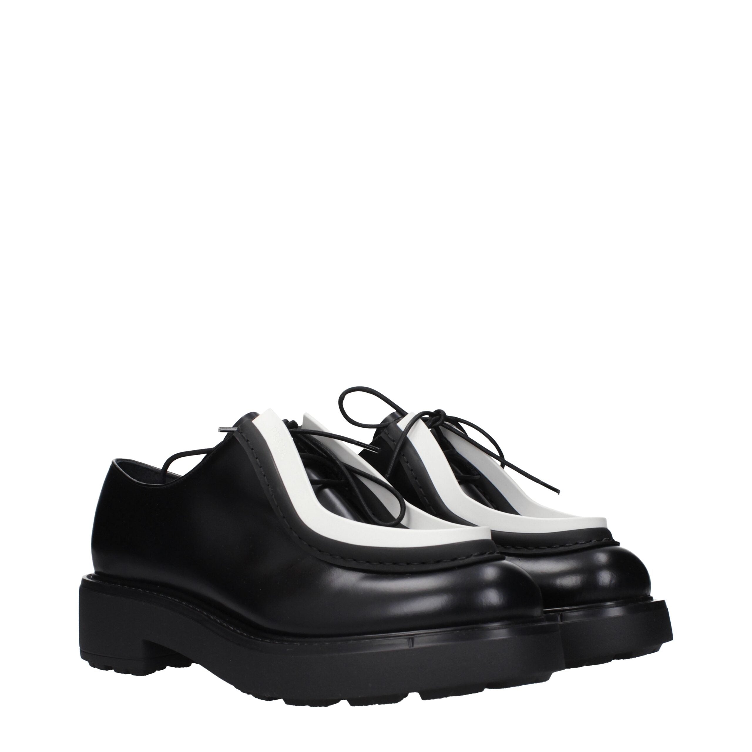 Oxfords Prada en cuir noirs